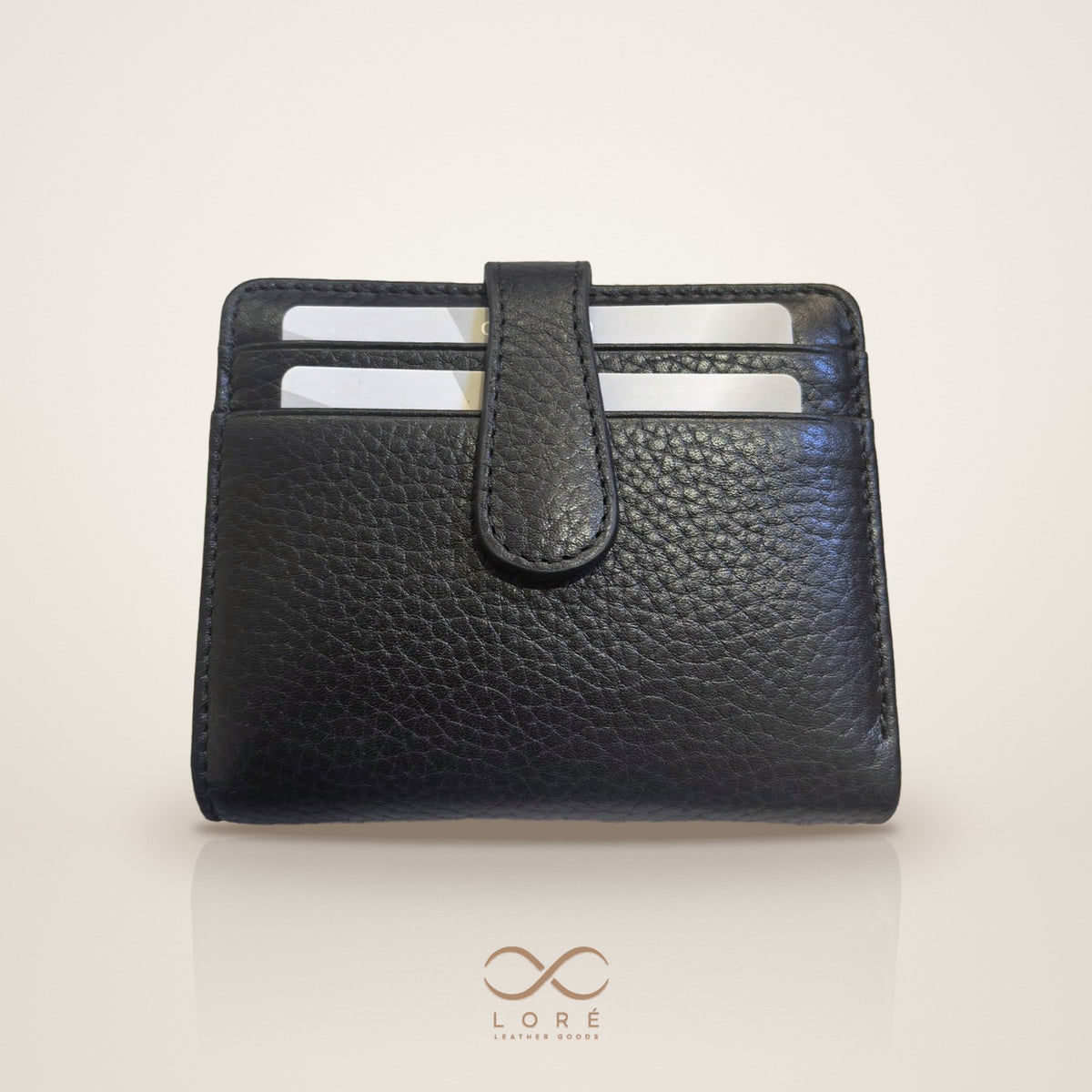 LORÉ Lumière 1295 in Black — front view with strap closure
